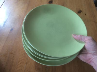 6 large plates taken in hands 1