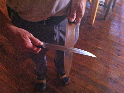 Sharpening knife against knife