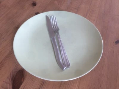 Cutlery, set on a plate
