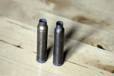Cartridge case 7.62mm on concrete 1