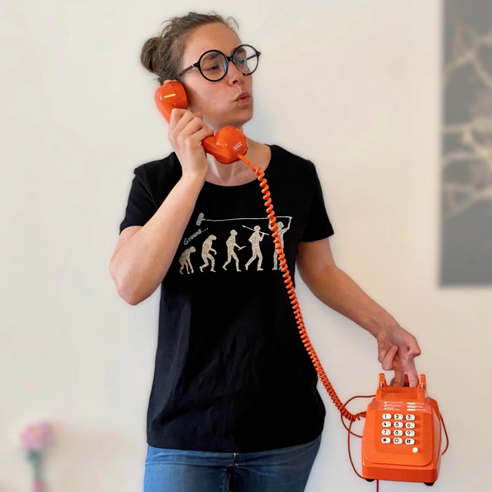 A woman wearing an Evolu'son t-shirt