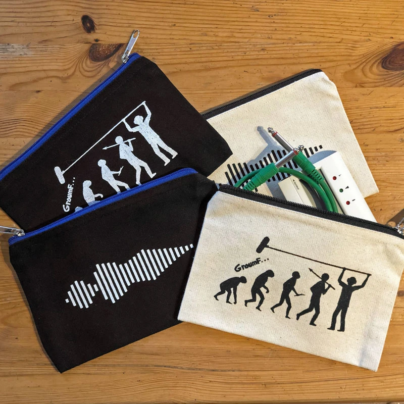 Trousse zippée avec un dessin onomatopée, ou preneur de son